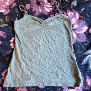 SO medium light green tank top. Used but in good condition.
